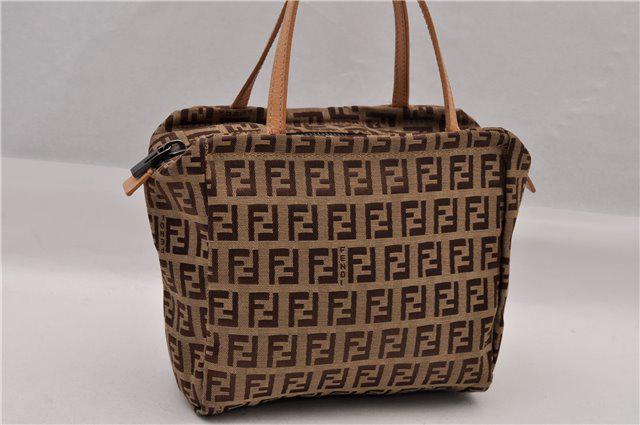 Authentic FENDI Canvas Hand Bag: Brand: FENDI Material: Canvas Style: Hand Bag Color: Beige Size(inch): W6.7 x H5.7 x D2.8" / Handle Drop 3.9"(Approx) Country of Origin: Italy Accessory: There is no ItemBox and DustBag.We will send o