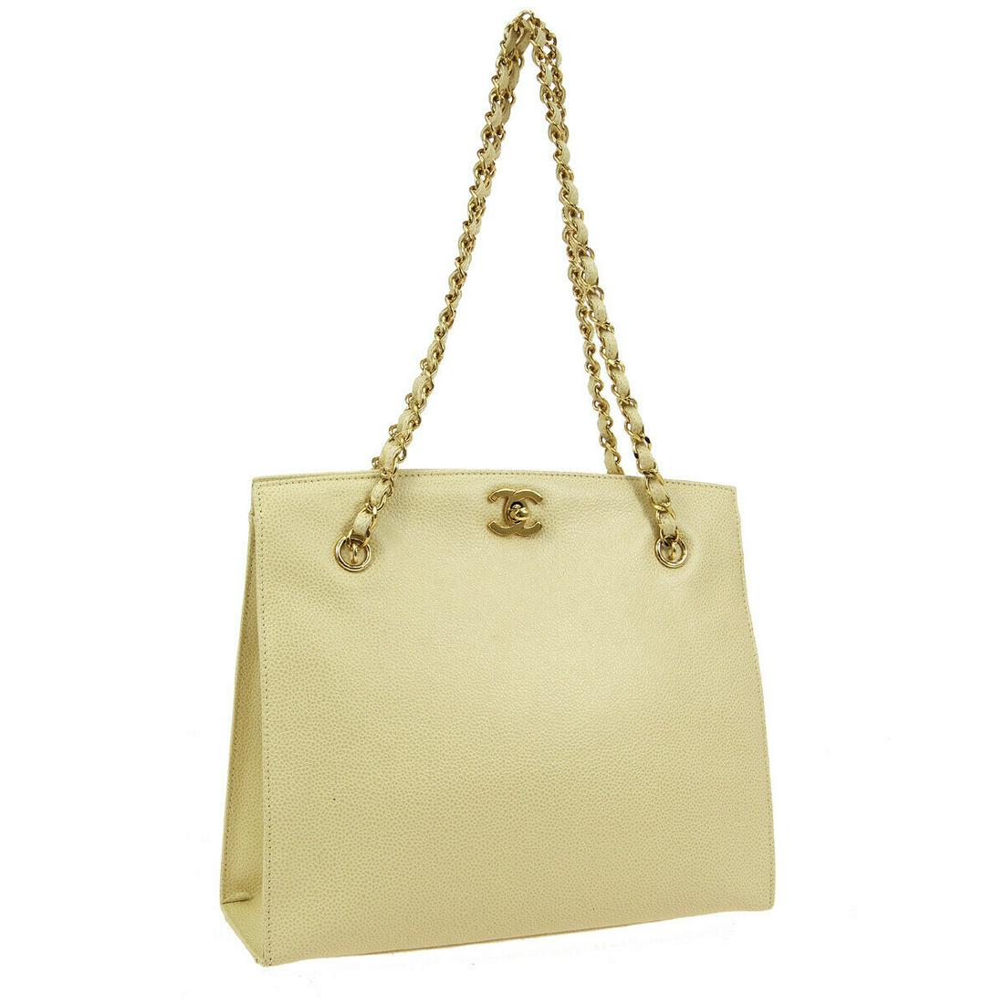 Authentic CHANEL Caviar Skin Leather Tote: Brand: CHANEL Material: Caviar Skin Leather Style: Tote Color: Cream Size(inch): W10.6 x H9.1 x D3.5 " / Strap Drop: 9.1 Size(inch): W 10.6 x H 9.1 x D 3.5 " Strap Drop. 9.1 " Country of Origin: Italy
