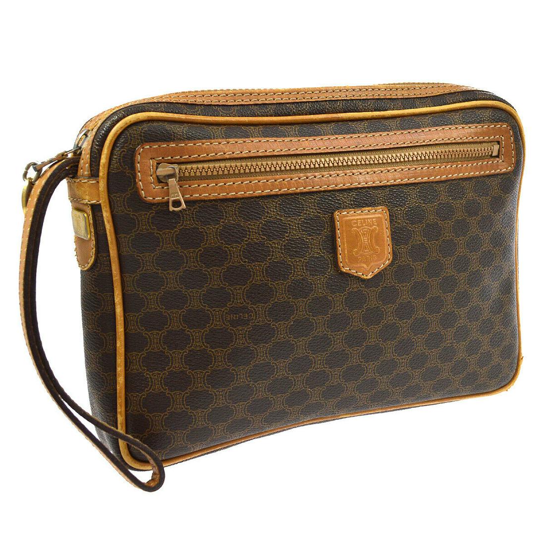 Authentic CELINE PVC, Leather Clutch: Brand: CELINE Material: PVC, Leather Style: Clutch Color: Brown Size(inch): W9.4 x H6.7 x D1.6 " Size(inch): W 9.4 x H 6.7 x D 1.6 " Country of Origin: Italy Come with: - All Bidhaus items come with a