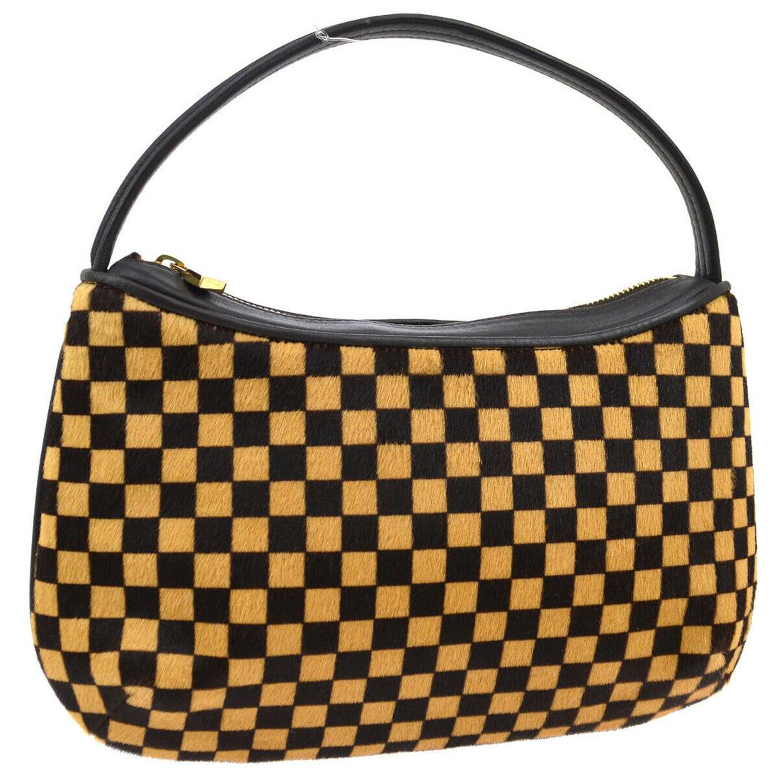 Authentic LOUIS VUITTON Fur, Leather Hand Bag: Brand: LOUIS VUITTON Material: Fur, Leather Style: Hand Bag Color: Brown Size(inch): W9.8 x H5.7 x D2.8 " / Strap Drop: 3.5 Size(inch): W 9.8 x H 5.7 x D 2.8 " Handle Drop. 3.5 " Country of Origin: It