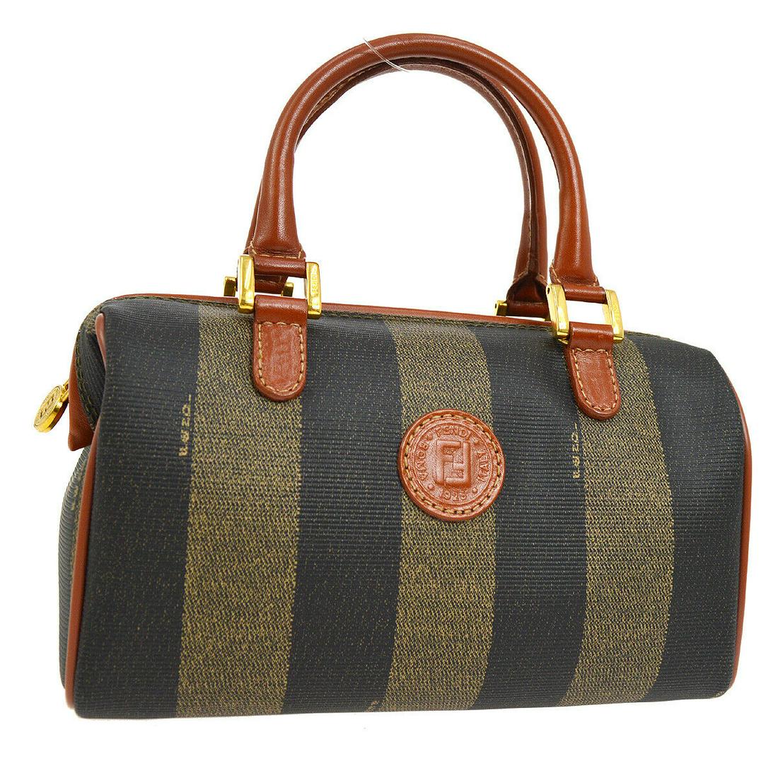 Authentic FENDI PVC, Leather Hand Bag: Brand: FENDI Material: PVC, Leather Style: Hand Bag Color: Brown, Black Size(inch): W7.9 x H5.1 x D3.9 " / Strap Drop: 3.1 Country of Origin: Italy Come with: - All Bidhaus items come with a 100% mone
