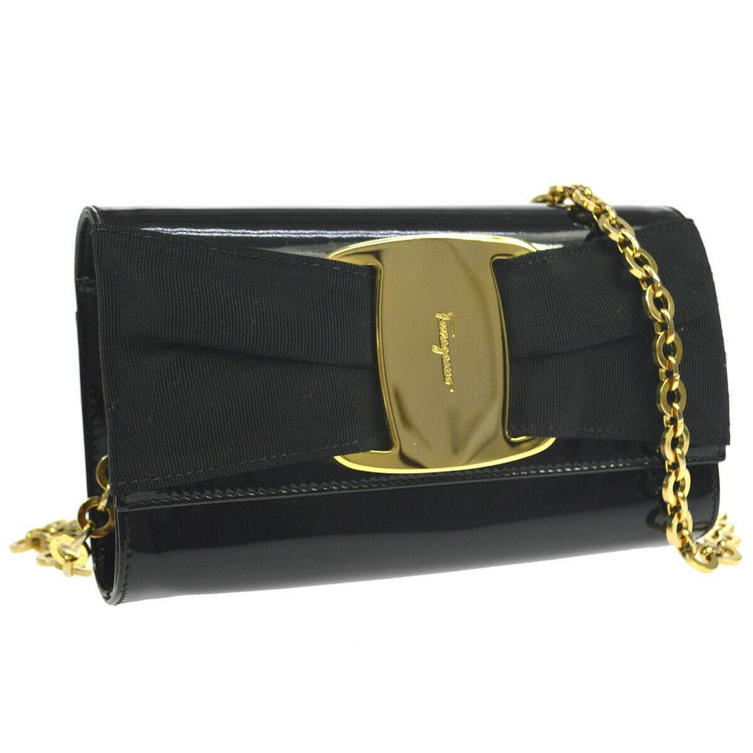 Authentic SALVATORE FERRAGAMO Patent Leather Shoulder: Brand: SALVATORE FERRAGAMO Material: Patent Leather Style: Shoulder bag Color: Black Size(inch): W7.3 x H4.3 x D1.6 " / Strap Drop: 20.1 Country of Origin: Italy Come with: Dust Bag All Bidhaus items