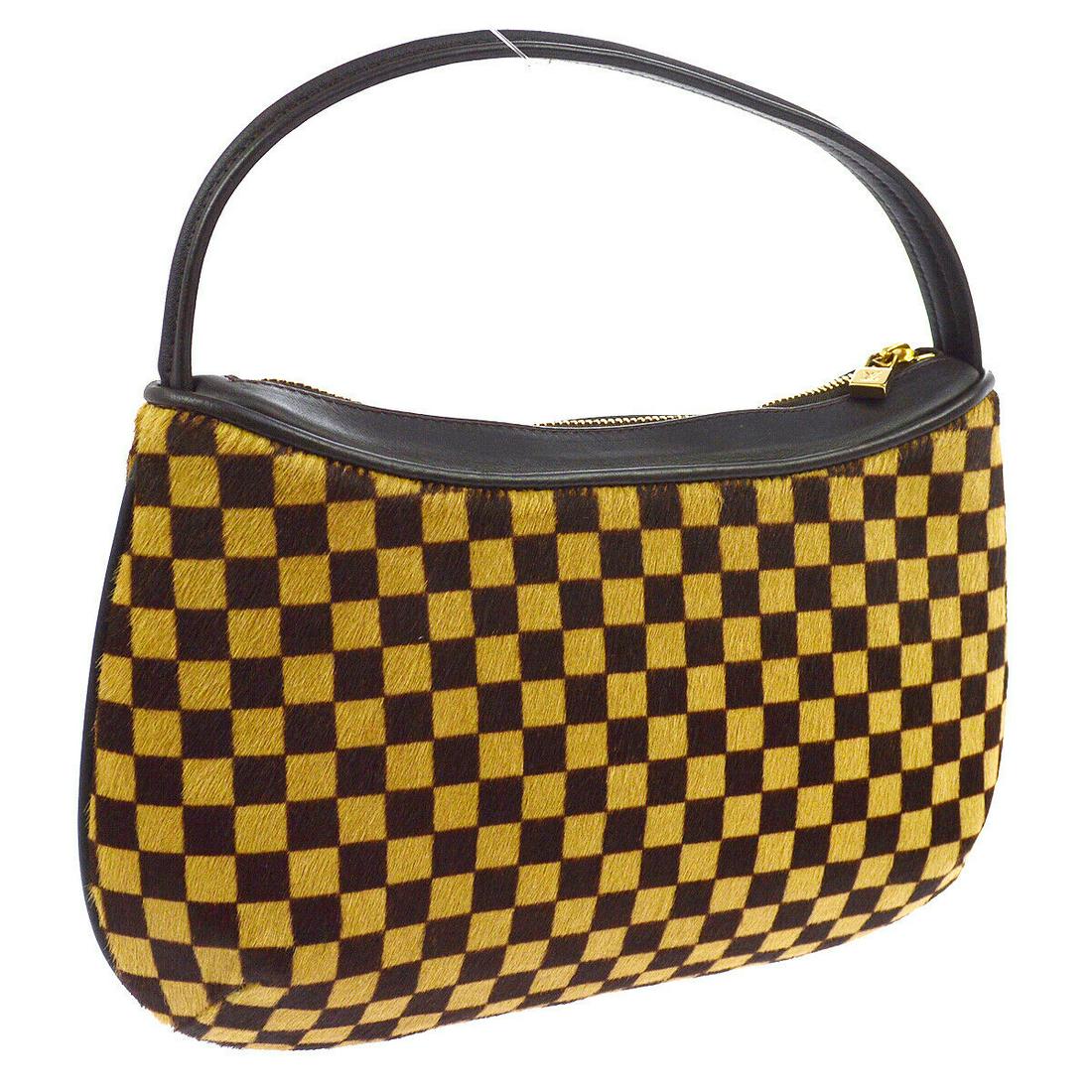 Authentic LOUIS VUITTON Fur, Leather Hand Bag: Brand: LOUIS VUITTON Material: Fur, Leather Style: Hand Bag Color: Brown Size(inch): W9.8 x H5.7 x D2.8 " / Strap Drop: 3.5 Size(inch): W 9.8 x H 5.7 x D 2.8 " Handle Drop. 3.5 " Country of Origin: It