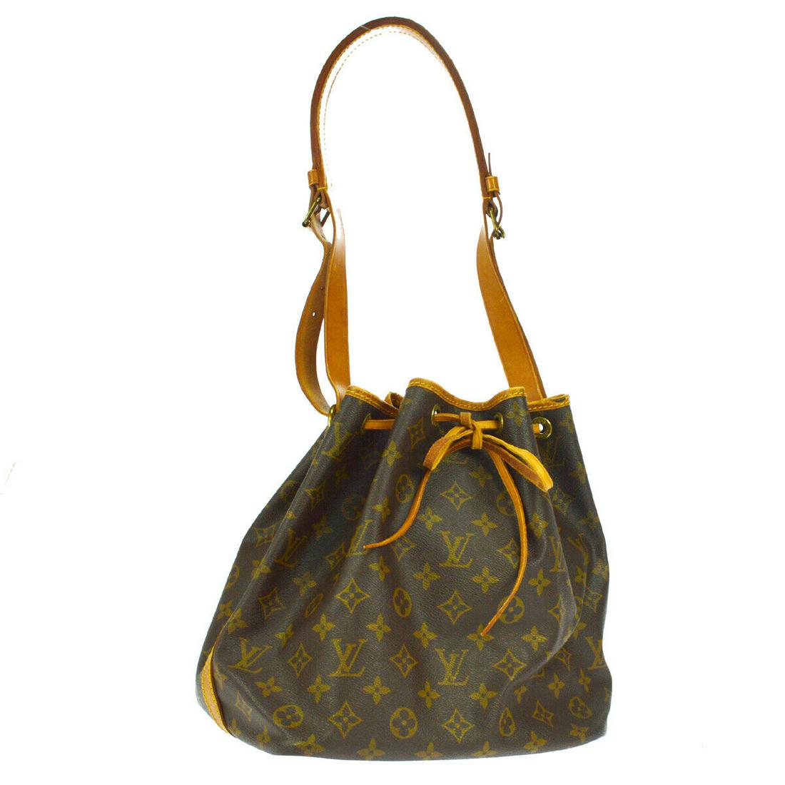 Authentic LOUIS VUITTON NOE Monogram Canvas, Leather: Brand: LOUIS VUITTON Material: Monogram Canvas, Leather Style: Shoulder Bag Color: Brown Size(inch): W9.4 x H10.2 x D7.1 " / Strap Drop: 10.2-11.0 Size(inch): W 9.4 x H 10.2 x D 7.1 " Strap Drop. 10.2
