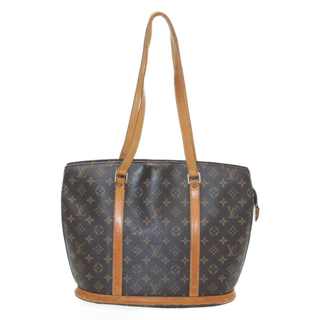 Authentic LOUIS VUITTON BABYLONE Monogram Canvas Tote: Brand: LOUIS VUITTON Material: Monogram Canvas Style: Tote Bag Color: Monogram Size(inch): W15.7 x H11.8 x D4.3â€³(Approx) Country of Origin: France Accessory: There is no item box and dust bag. W