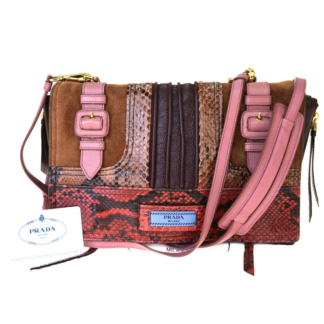 Authentic PRADA Leather, Suede skin Leather Hand bag: Brand: PRADA Material: Leather, Suede skin Leather Style: Hand bag Color: Bordeaux Size(inch): W 11 x H 8.3 x D 5.1 "(approx.) Country of Origin: Italy Come with: Dust bag,Shoulder strap All Bidhaus i
