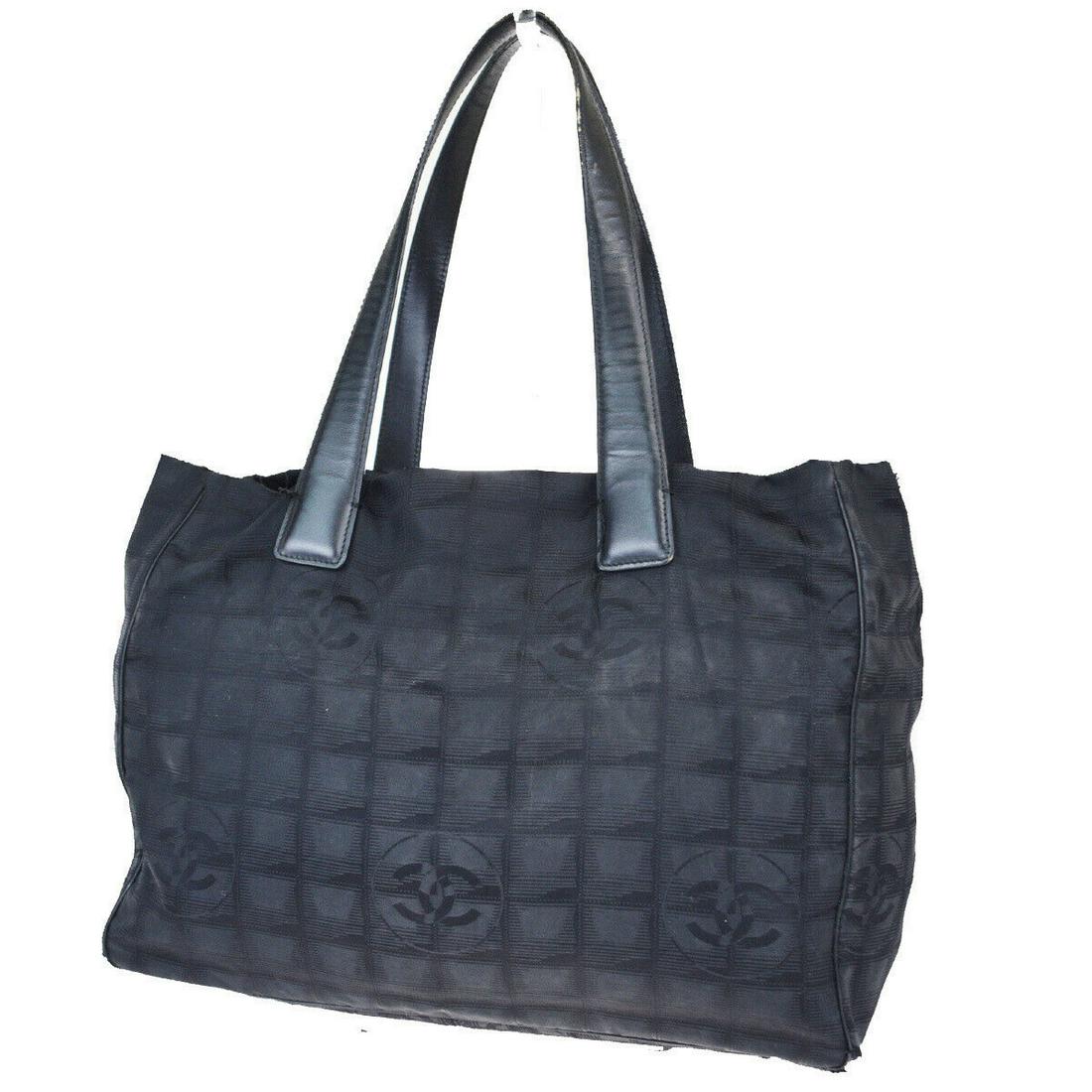 Authentic CHANEL Jacquard, Leather Tote Bag: Brand: CHANEL Material: Jacquard, Leather Style: Tote bag Color: Black Size (HxWxD): 27cm x 34cm x 14cm / 10.62'' x 13.38'' x 5.51'' Country of Origin: Italy All Bidhaus items come with a 100% money-b