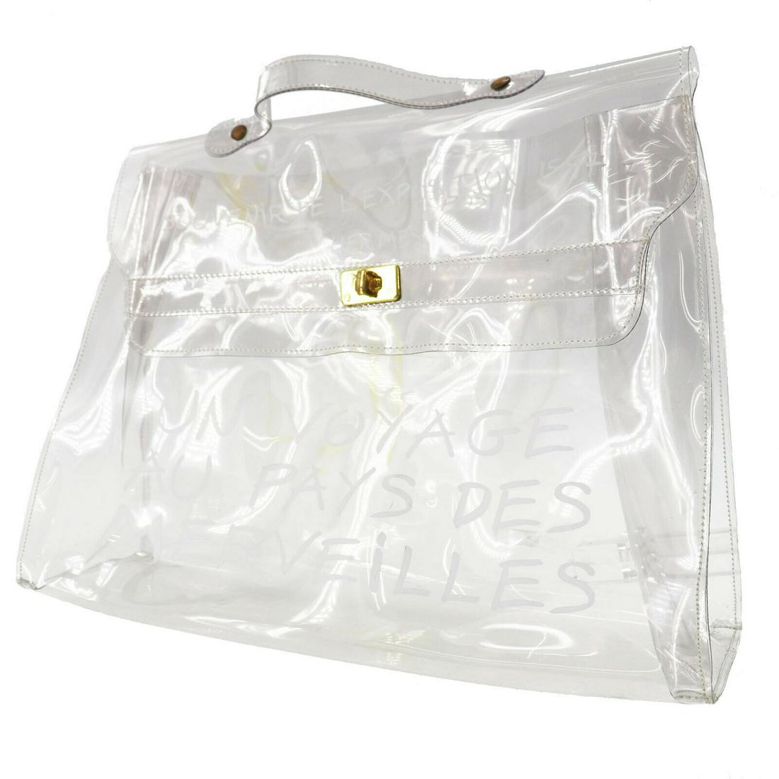 Authentic HERMES KELLY 40 Vinyl Hand Bag: Brand: HERMES Material: Vinyl Style: Hand Bag Color: Clear Size(Inch): H 11.4 x D 4.5 x L 15.7 Handle : 9.6 Country of Origin: France All Bidhaus items come with a 100% money-back authenticity guarant
