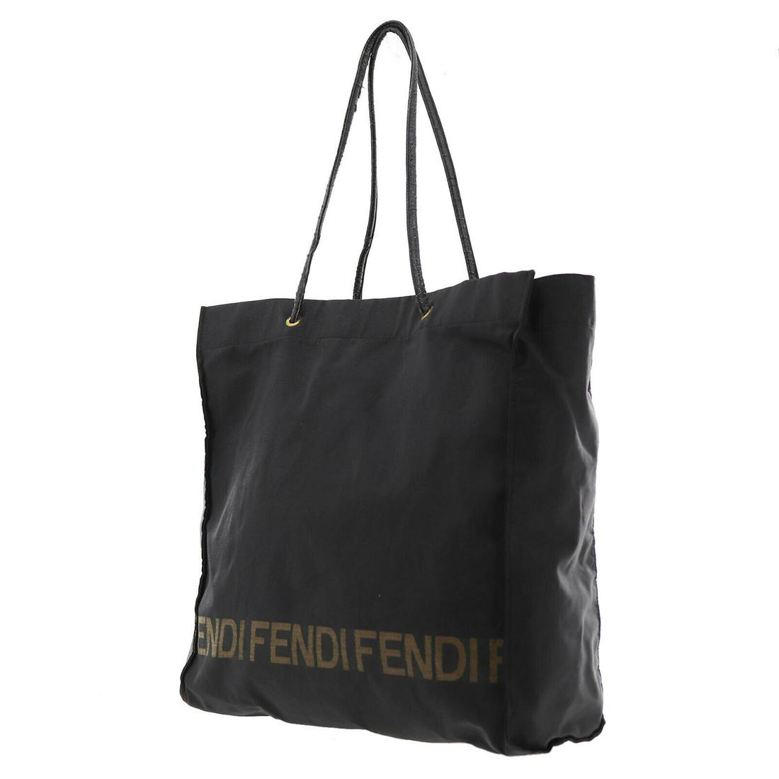 Authentic FENDI VINTAGE Nylon Tote: Brand: FENDI Material: Nylon Style: Tote Color: Black Size(Inch): H 15.3 x D 6.1 x L 14.5 Strap : 21.2 Country of Origin: Italy Come with: - All Bidhaus items come with a 100% money-back authenticity 