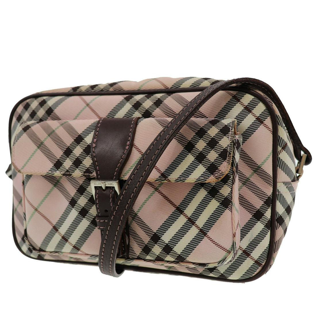 Authentic BURBERRYS Nylon Canvas Shoulder Bag: Brand: BURBERRYS Material: Nylon Canvas Style: Shoulder Bag Color: Pink Brown Size(Inch): H 5.9 x D 3.1 x L 8.6 Shoulder: 48.4 - 55.5 Country of Origin: Japan Come with: - All Bidhaus items come with