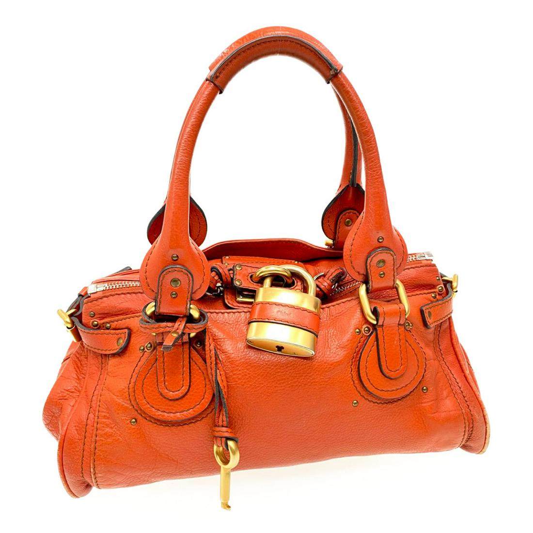 Authentic CHLOE Paddington Hand Bag Orange Leather: Brand: CHLOE Style: Hand Bag Material: Leather Color: Orange Made in: Italy Size (Inches): W14.17 x H7.08 x D7.08inch(Approx) Exterior Condition: Garment Leather : slightly lose shape, rubbing Handle 