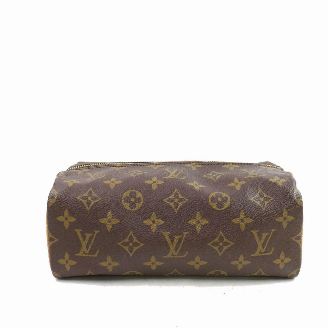 Authentic LOUIS VUITTON Monogram Cosmetic Pouch: Brand: LOUIS VUITTON Material: Monogram Style: Cosmetic Pouch Color: Browns Size(inch): W9.05 inch(approx) /23 cm(approx) x H3.93 inch(approx) /10 cm(approx) x D5.31 inch(approx) /13.5 cm(approx) " Co