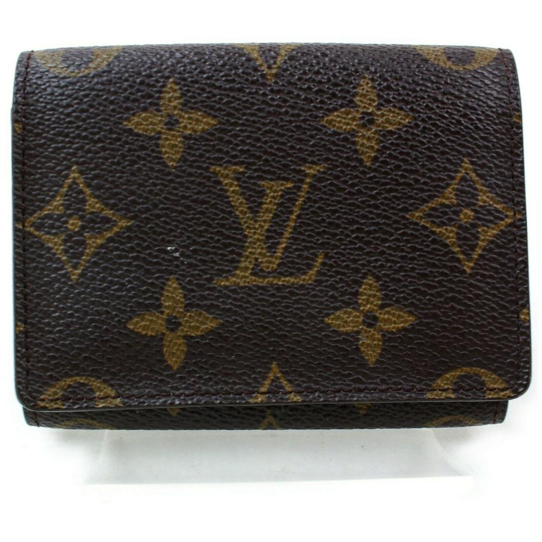 Authentic LOUIS VUITTON Monogram Card Case: Brand: LOUIS VUITTON Material: Monogram Style: Card Case Color: Browns Size(inch): W2.95 inch(approx) /7.5 cm(approx) x H3.93 inch(approx) /10 cm(approx) x D0.39 inch(approx) /1 cm(approx) " Country o