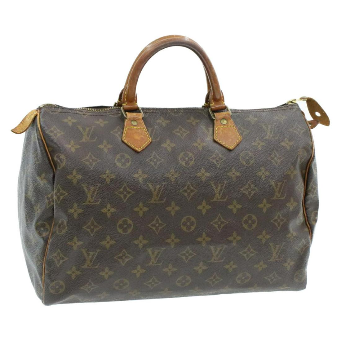 Authentic LOUIS VUITTON SPEEDY 35 Monogram Canvas Hand: Brand: LOUIS VUITTON Material: Monogram Canvas Style: Hand Bag Color: Monogram Size(inch): W14 x H9 x D7.5â€³(Approx) Country of Origin: France Accessory: There is no item box and dust bag. We wil