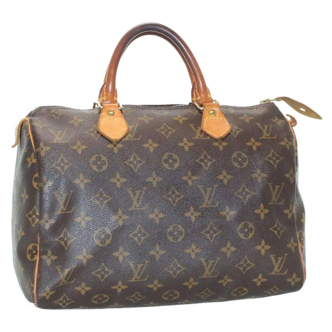 Authentic LOUIS VUITTON SPEEDY 30 Monogram Canvas Hand: Brand: LOUIS VUITTON Material: Monogram Canvas Style: Hand Bag Color: Monogram Size(inch): W12 x H9 x D6.5â€³(Approx) Country of Origin: France Accessory: There is no item box and dust bag. We wil