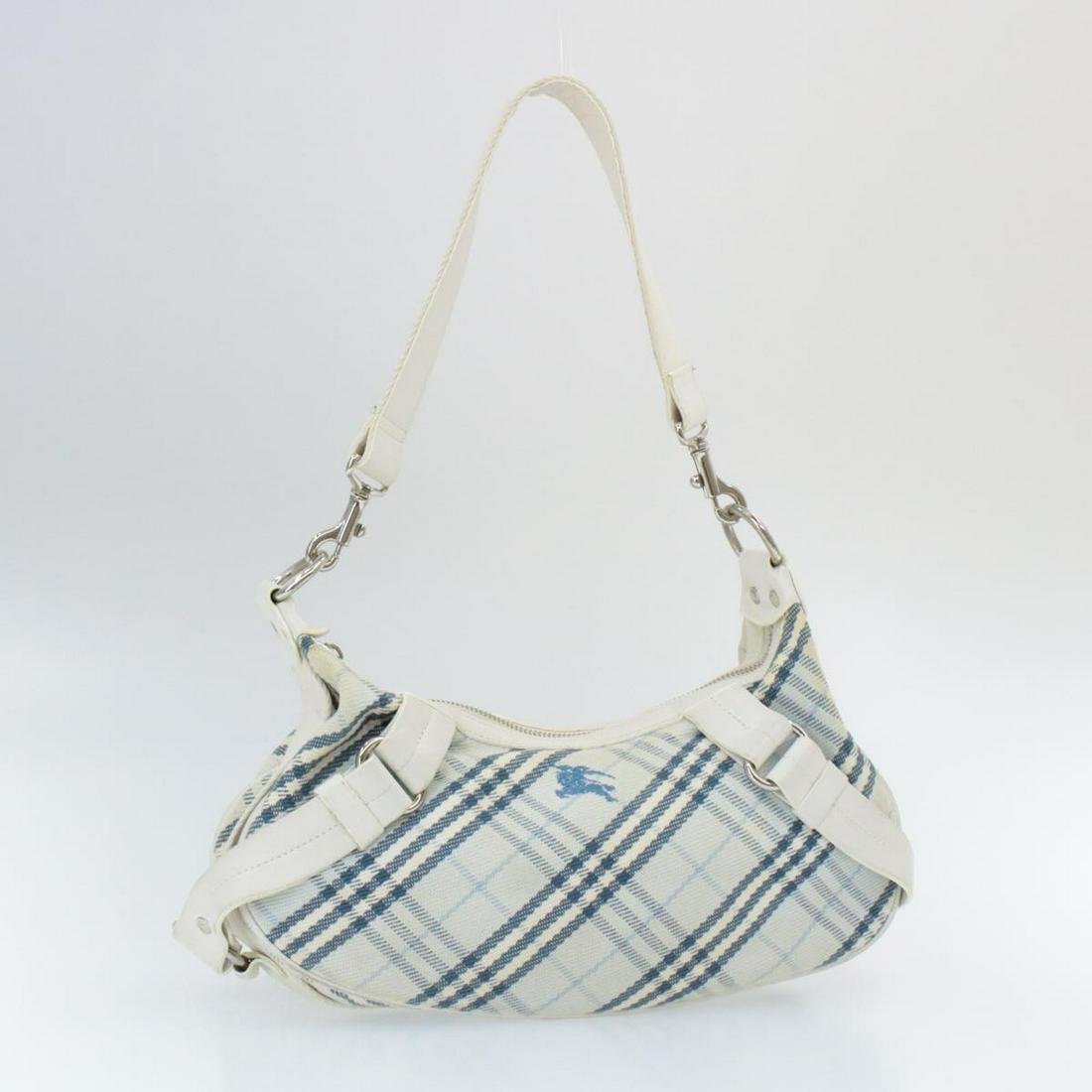 Authentic BURBERRY Canvas Shoulder Bag: Brand: BURBERRY Material: Canvas Style: Shoulder Bag Color: Light Blue Size(inch): W11.41 x H5.11 x D4.33â€³ / Shoulder Drop 12.59â€³(Approx) Country of Origin: Japan Accessory: There is no it