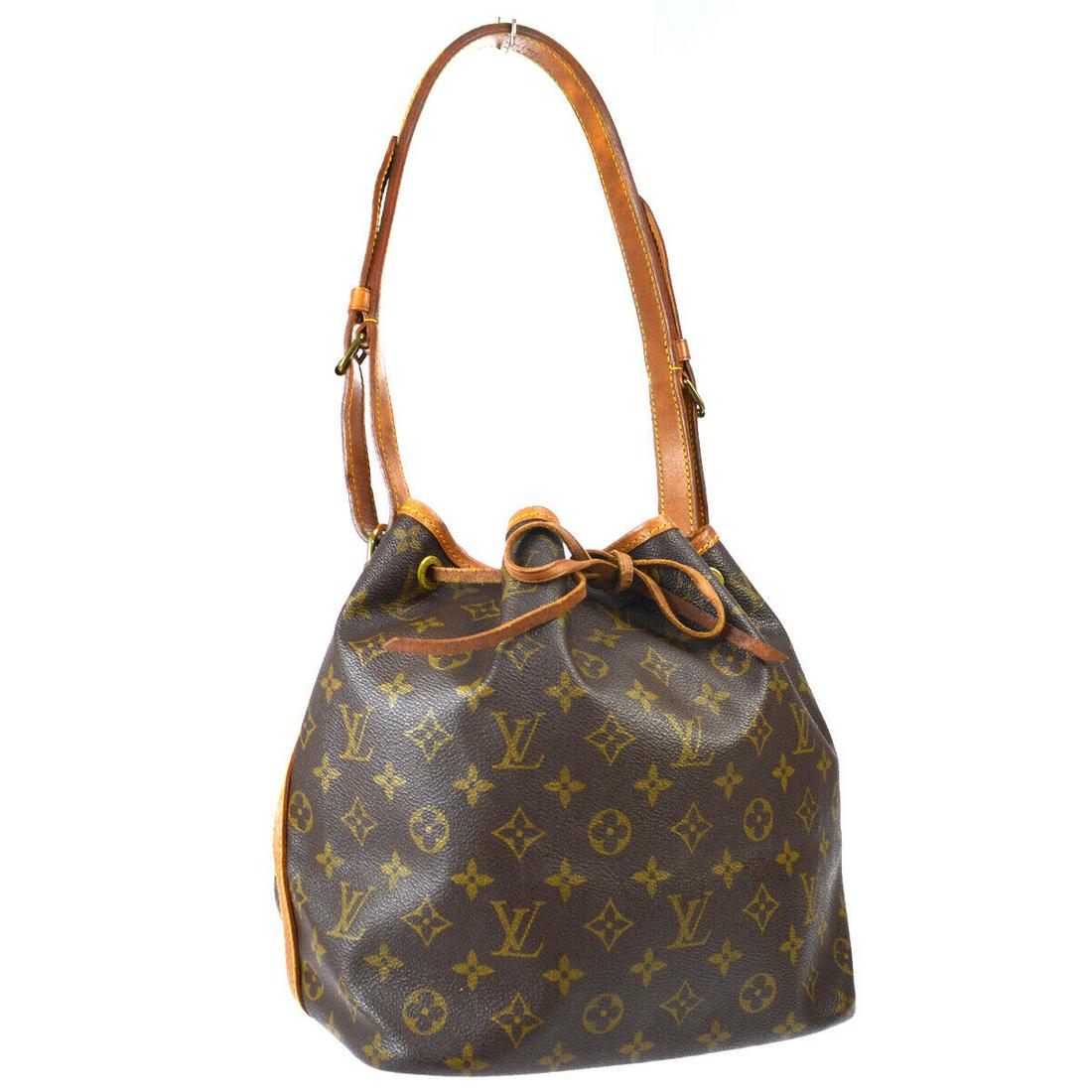 Authentic LOUIS VUITTON NOE Monogram Canvas, Leather: Brand: LOUIS VUITTON Material: Monogram Canvas, Leather Style: Shoulder Bag Color: Browns Country of Origin: France Come with: - All Bidhaus items come with a 100% money-back authenticity guarantee. A