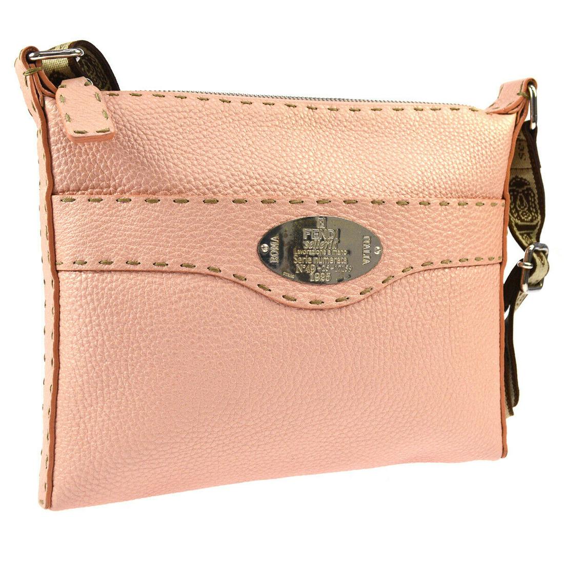 Authentic FENDI Leather Cross Body: Brand: FENDI Material: Leather Style: Cross Body Color: Pink Size(inch): W9.8 x H8.3 x D0.8 " / Strap Drop: 11.8 - 23.2 Size(inch): W 9.8 x H 8.3 x D 0.8 " Strap Drop. 11.8 - 23.2 " Country of Origin:
