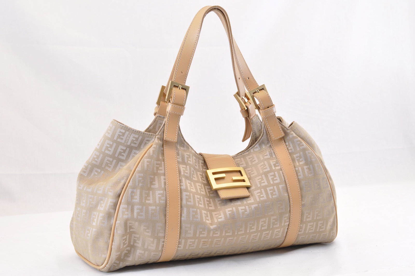 Authentic FENDI Canvas Shoulder Bag: Brand: FENDI Material: Canvas Style: Shoulder Bag Color: khaki Size(inch): W15.35 x H8.26 x D5.91inch(Approx) Country of Origin: Italy Accessory: There is no item box and dust bag. We will send only t