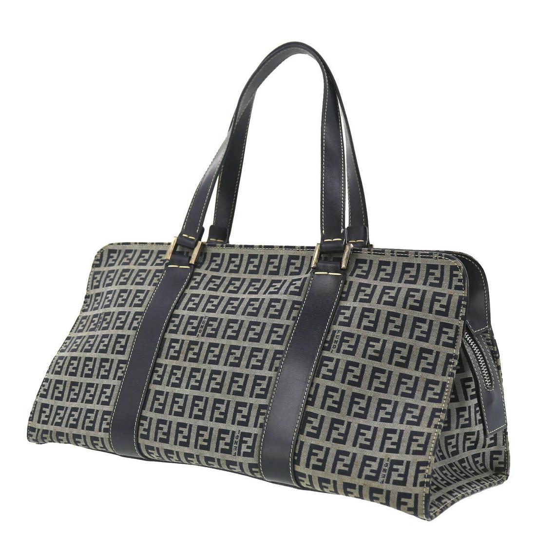 Authentic FENDI VINTAGE Canvas Hand Purse: Brand: FENDIMaterial: CanvasStyle: Hand PurseColor: NavySize(Inch): H 7.0 x D 6.6 x L 14.5Handle : 17.3Country of Origin: ItalyCome with:All Bidhaus items come with a 100% money-back authenticity guar