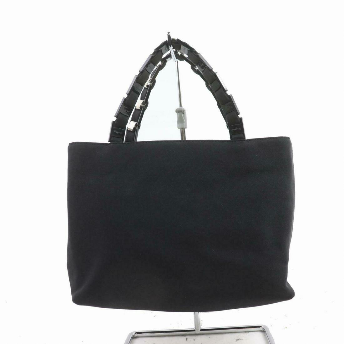 Authentic FERRAGAMO Nylon Hand Bag: Brand: FERRAGAMOMaterial: NylonStyle: Hand BagColor: BlackSize(inch): W9.05 inch(approx) /23 cm(approx) x H6.29 inch(approx) /16 cm(approx) x D3.74 inch(approx) /9.5 cm(approx) "Country of Origin: Ita