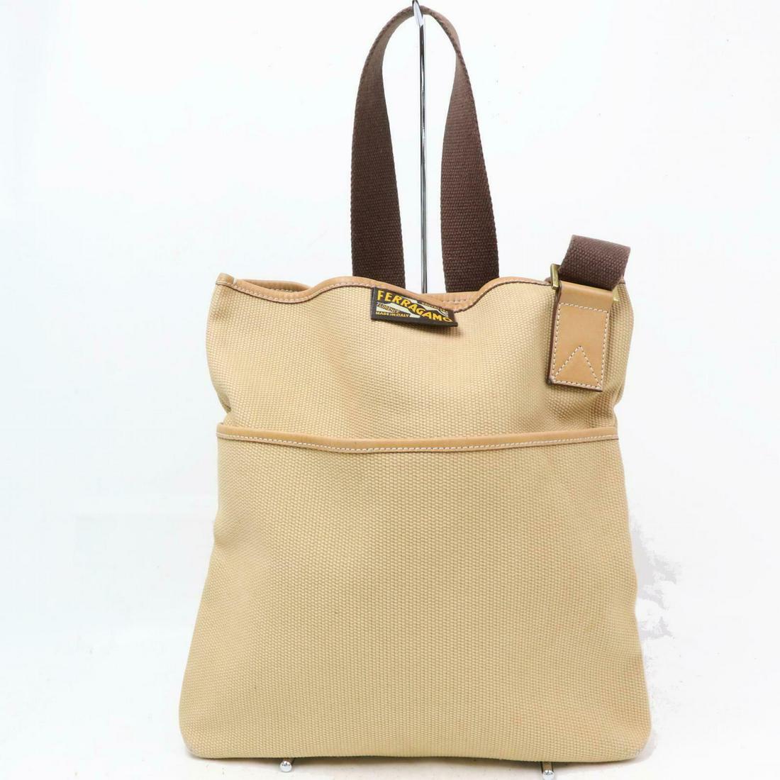 Authentic FERRAGAMO Canvas Shoulder Bag: Brand: FERRAGAMOMaterial: CanvasStyle: Shoulder BagColor: Light BrownSize(inch): W13.3 inch(approx) /34 cm(approx) x H14.9 inch(approx) /38 cm(approx) x D1.77 inch(approx) /4.5 cm(approx) " / Strap Dr