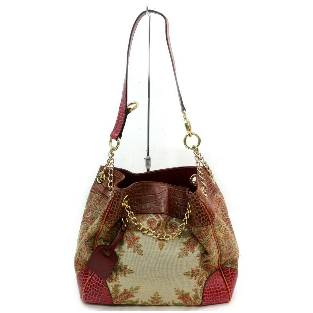 Authentic ETRO Canvas Shoulder Bag: Brand: ETROMaterial: CanvasStyle: Shoulder BagColor: BrownsSize(inch): W12.2 inch(approx) /31 cm(approx) x H11.4 inch(approx) /29 cm(approx) x D5.51 inch(approx) /14 cm(approx) " / Strap Drop: Shoulde