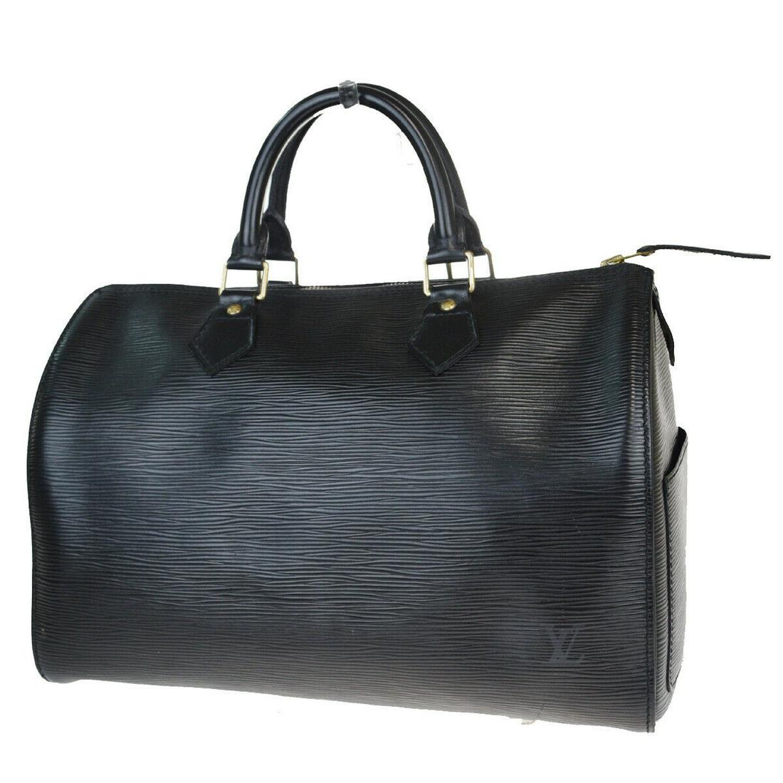 Authentic LOUIS VUITTON SPEEDY 30 Epi Leather Hand Bag: Brand: LOUIS VUITTONMaterial: Epi LeatherStyle: Hand bagColor: BlackSize(inch): W 11.8 x H 8.7 x D 6.3 "(approx.)Country of Origin: FranceCome with: -All Bidhaus items come with a 100% money-back auth