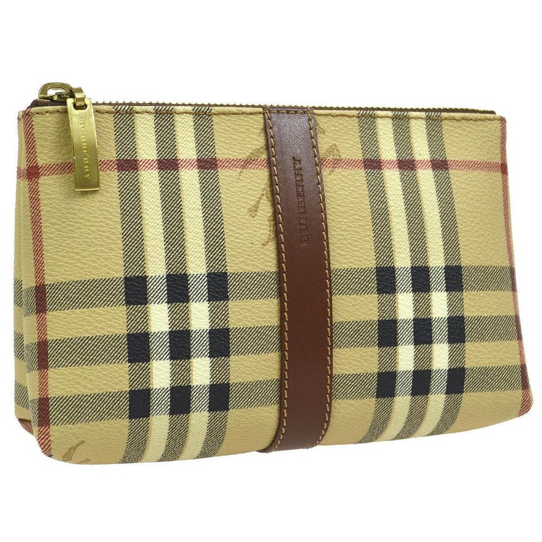 Authentic BURBERRY PVC, Leather Pouch: Brand: BURBERRYMaterial: PVC, LeatherStyle: PouchColor: Beige, Brown, etcSize(inch): W6.9 x H4.7 x D2.2 "Size(inch): W 6.9 x H 4.7 x D 2.2 "Country of Origin: ItalyCome with: -All Bidhaus items come w