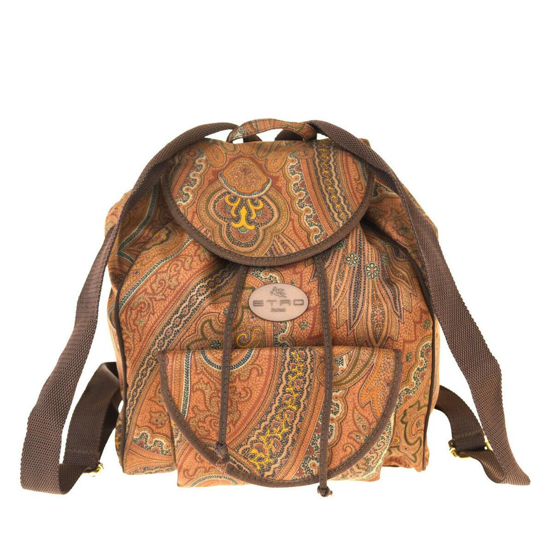 Authentic ETRO Nylon Backpack Bag: Brand: ETROMaterial: NylonStyle: Backpack BagColor: BrownSize(inch): W 10.2 x H 13.8 x D 5.9 "(approx.)Country of Origin: -Come with: -All Bidhaus items come with a 100% money-back authenticity guaran