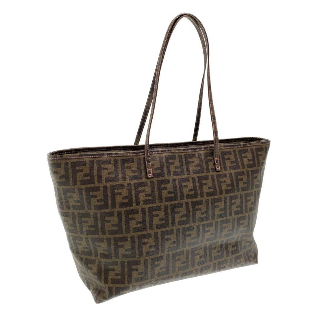 Authentic FENDI PVC Leather Tote Bag: Brand: FENDIMaterial: PVC LeatherStyle: Tote BagColor: Brown / PinkSize(inch): W13.39 x H10.63 x D5.91inch(Approx)Country of Origin: ItalyAccessory: There is no item box and dust bag. We will send onl