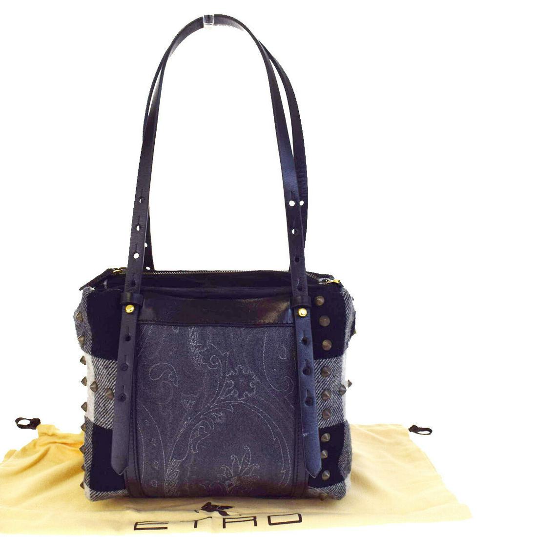 Authentic ETRO PVC Leather,Wool Shoulder Bag: Brand: ETROMaterial: PVC Leather,WoolStyle: Shoulder BagColor: BlackSize(inch): W 9.1 x H 7.9 x D 4.7 "(approx.)Country of Origin: ItalyCome with: Dust bagAll Bidhaus items come with a 100% money-back