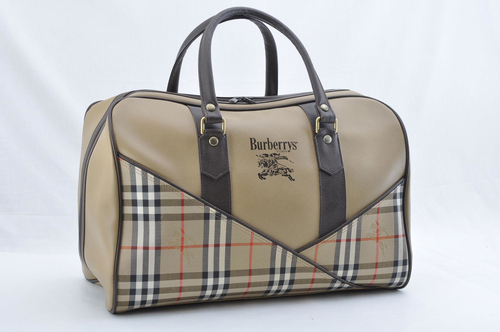 Authentic BURBERRYS PVC Leather Boston Bag: Brand: BURBERRYSMaterial: PVC LeatherStyle: Boston BagColor: Nova CheckSize(inch): W17.32 x H11.81 x D9.44inch(Approx)Country of Origin: â€“Accessory: There is no item box and dust bag. We will s