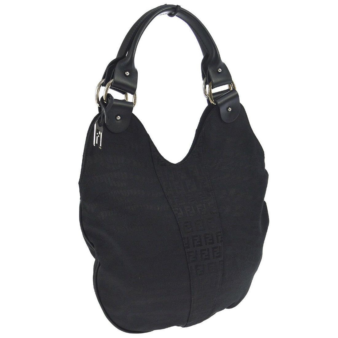 Authentic FENDI Canvas, Leather Hand Bag: Brand: FENDIMaterial: Canvas, LeatherStyle: Hand BagColor: BlackSize(inch): W12.6 x H11.0 x D0.4 " / Strap Drop: 8.3Size(inch): W 12.6 x H 11.0 x D 0.4 "Handle Drop. 8.3 "Country of Origin: ItalyCome 