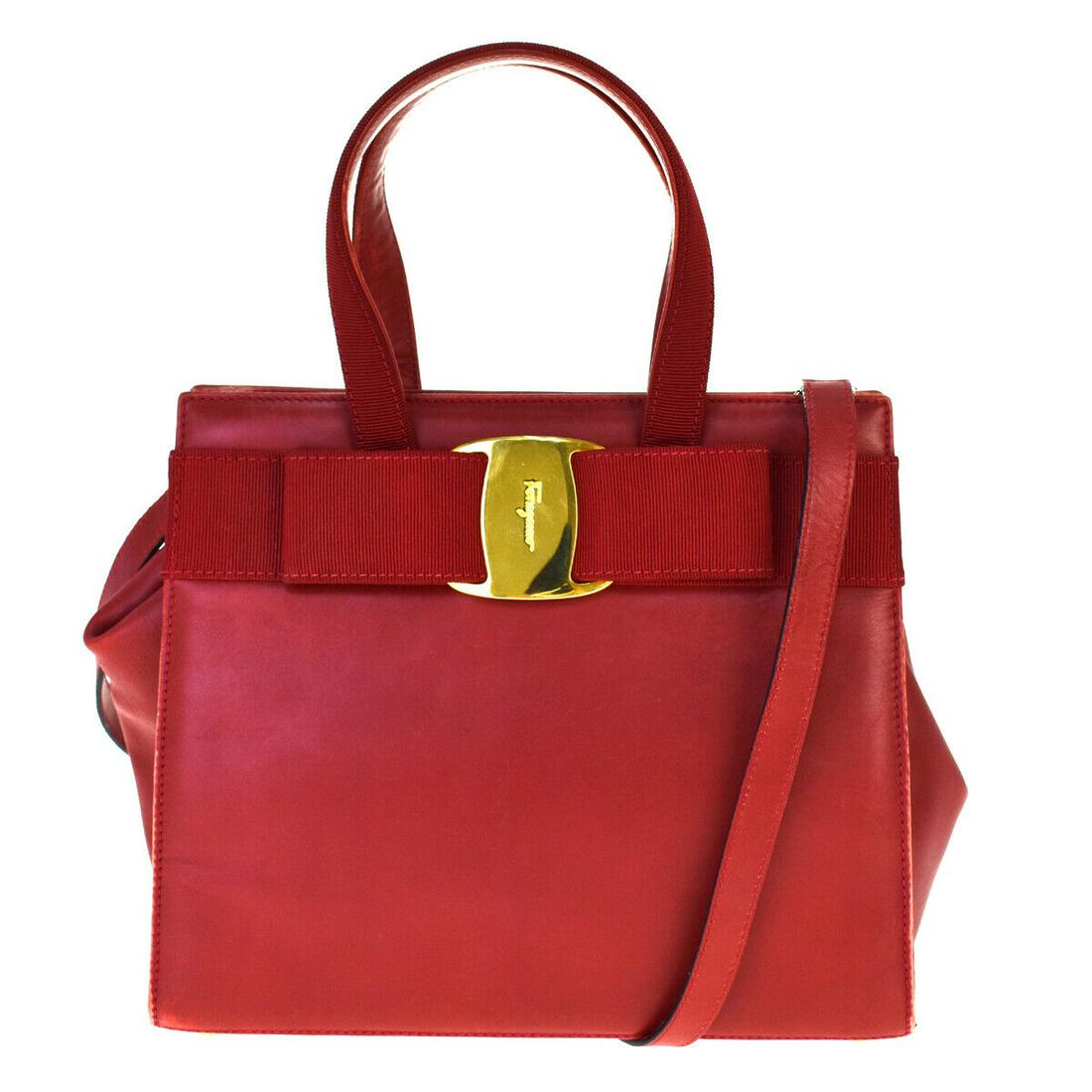 Authentic SALVATORE FERRAGAMO Leather Hand bag: Brand: SALVATORE FERRAGAMOMaterial: LeatherStyle: Hand bagColor: RedSize(inch): W 9.8 x H 7.9 x D 3.9 "(approx.)Country of Origin: ItalyCome with: Shoulder strapAll Bidhaus items come with a 100% mone