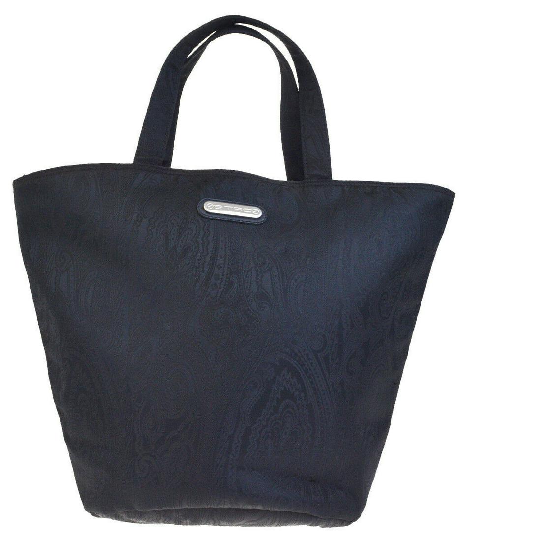 Authentic ETRO Nylon Leather Hand bag: Brand: ETROMaterial: Nylon LeatherStyle: Hand bagColor: BlackCountry of Origin: ItalyCome with: -All Bidhaus items come with a 100% money-back authenticity guarantee. ALL SALES ARE FINAL. Please refer