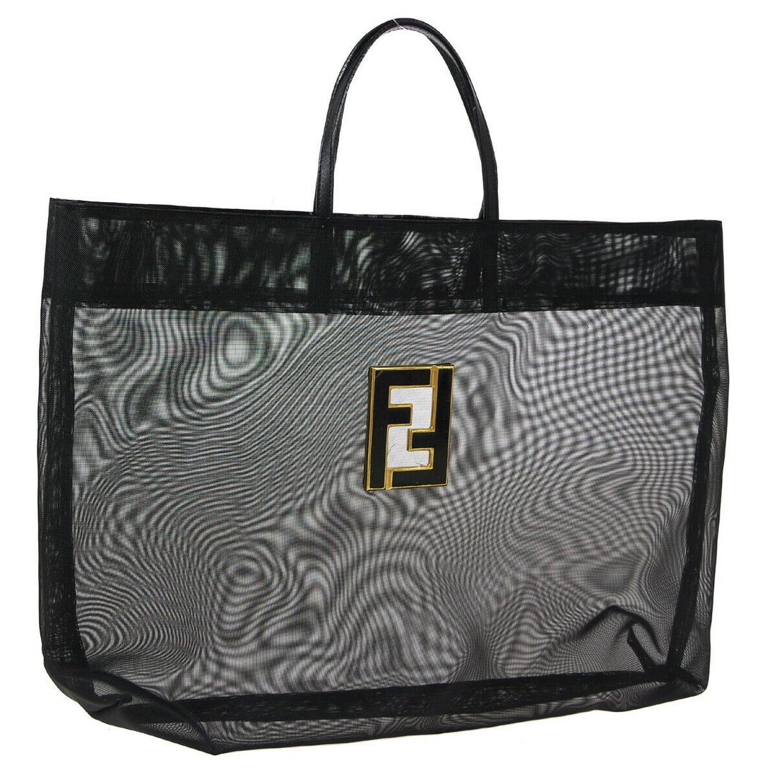 Authentic FENDI PVC, Nylon, Leather Tote: Brand: FENDIMaterial: PVC, Nylon, LeatherStyle: ToteColor: BlackSize(inch): W17.3 x H13.4 x D4.3 "Size(inch): W 17.3 x H 13.4 x D 4.3 "Handle Drop. 4.7 "Country of Origin: ItalyCome with: -All Bidhaus