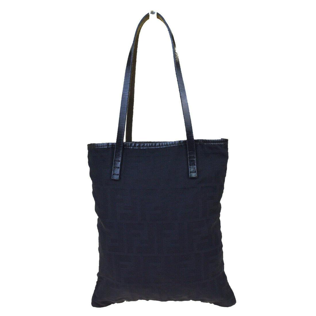 Authentic FENDI Leather, Nylon Shoulder Bag: Brand: FENDIMaterial: Leather, NylonStyle: Shoulder BagColor: BlackSize(inch): W 8.7 x H 9.4 x D 0.4 "(approx.)Country of Origin: ItalyCome with: -All Bidhaus items come with a 100% money-back authent