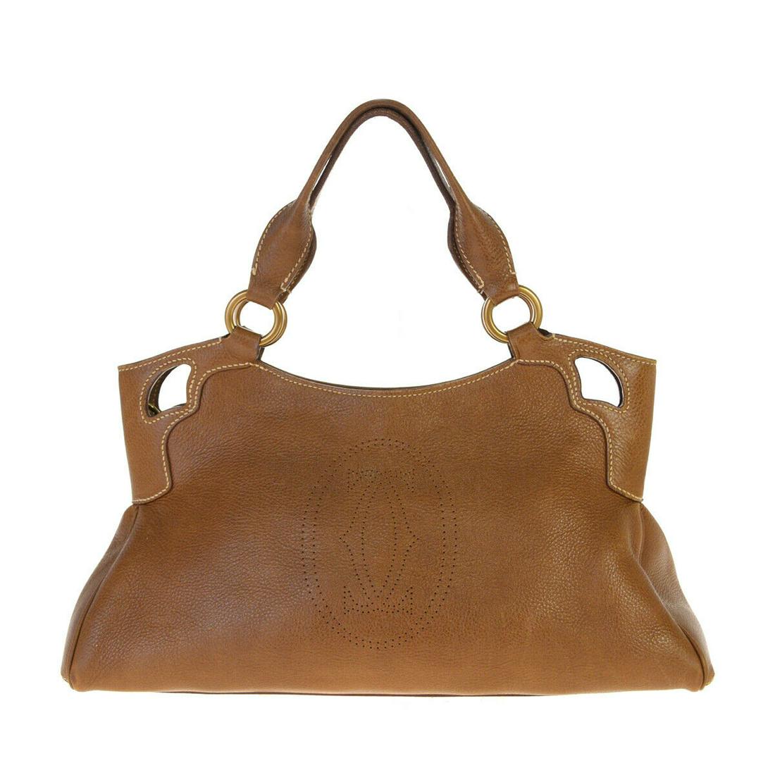 Authentic CARTIER Leather Hand bag: Brand: CARTIERMaterial: LeatherStyle: Hand bagColor: BrownSize(inch): W 14.2 x H 6.7 x D 4.7 "(approx.)Country of Origin: ItalyCome with: -All Bidhaus items come with a 100% money-back authenticity gu