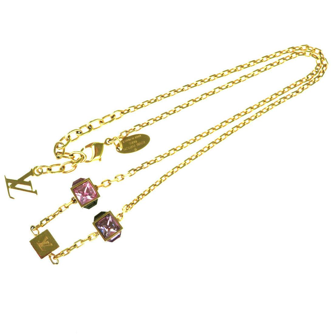 Authentic LOUIS VUITTON Gold-Tone,Rubber.Canvas: Brand: LOUIS VUITTONMaterial: Gold-Tone,Rubber.CanvasStyle: NecklaceColor: GoldCountry of Origin: FranceCome with: -All Bidhaus items come with a 100% money-back authenticity guarantee. ALL SALES ARE