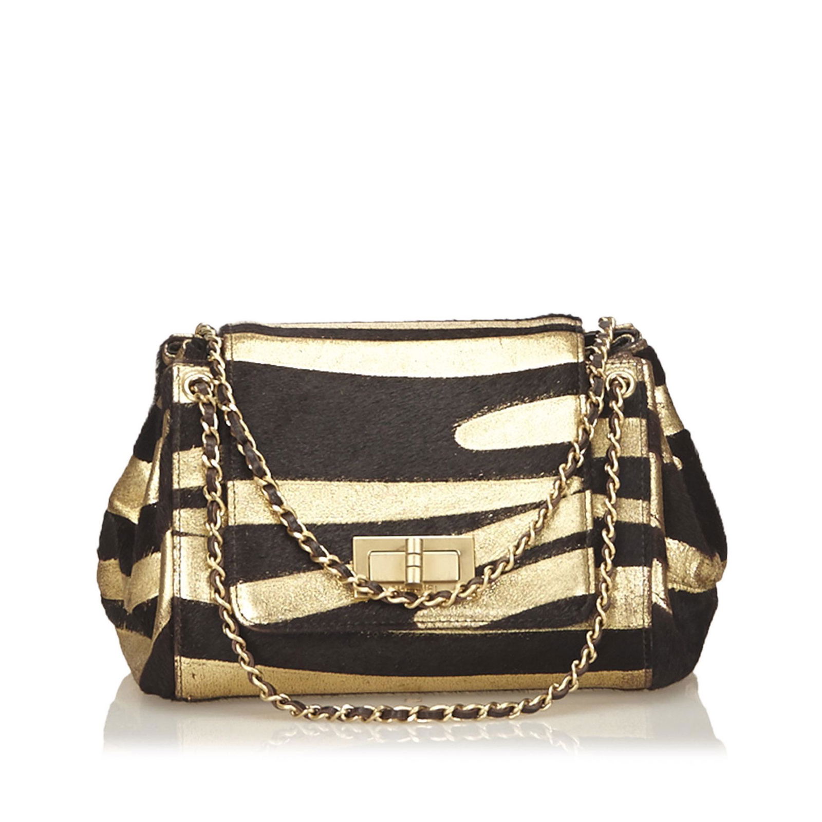 Authentic Chanel Zebra Print Pony Hair Reissue Flap Bag: This shoulder bag features a zebra print pony hair body, gold-tone shoulder chains, and a top flap with a reissue twist lock closure.Brand: Chanel Model: Zebra Print Pony Hair Reissue Flap Bag Origin: