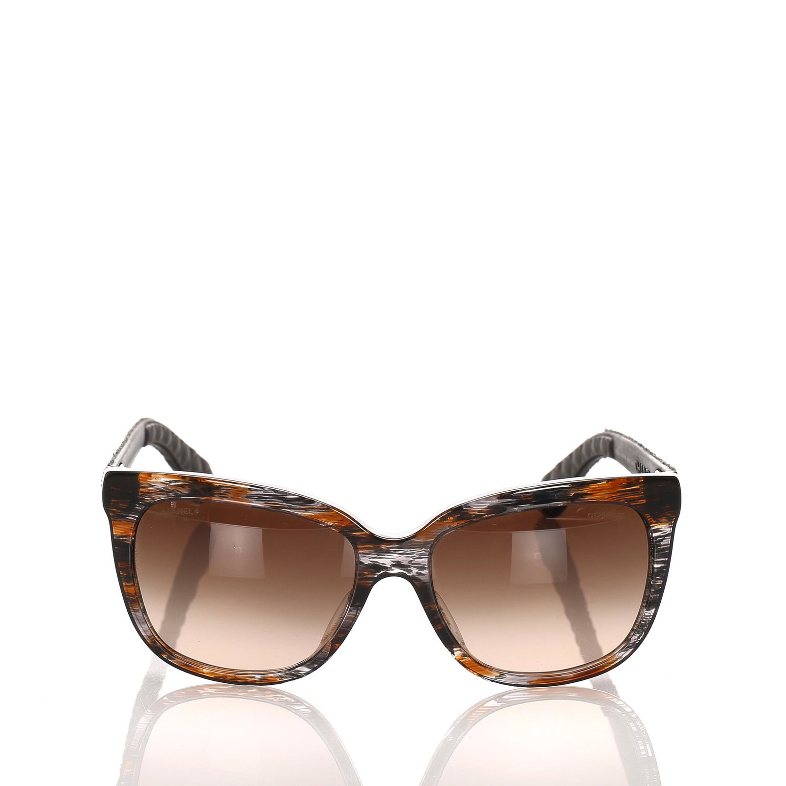 Authentic Chanel Wayfarer Tinted Sunglasses: These sunglasses feature an acetate body, denim details, and tinted lenses.Brand: Chanel Model: Wayfarer Tinted Sunglasses Origin: France Category: Sunglasses Color: Black x Brown Style: Others Materi