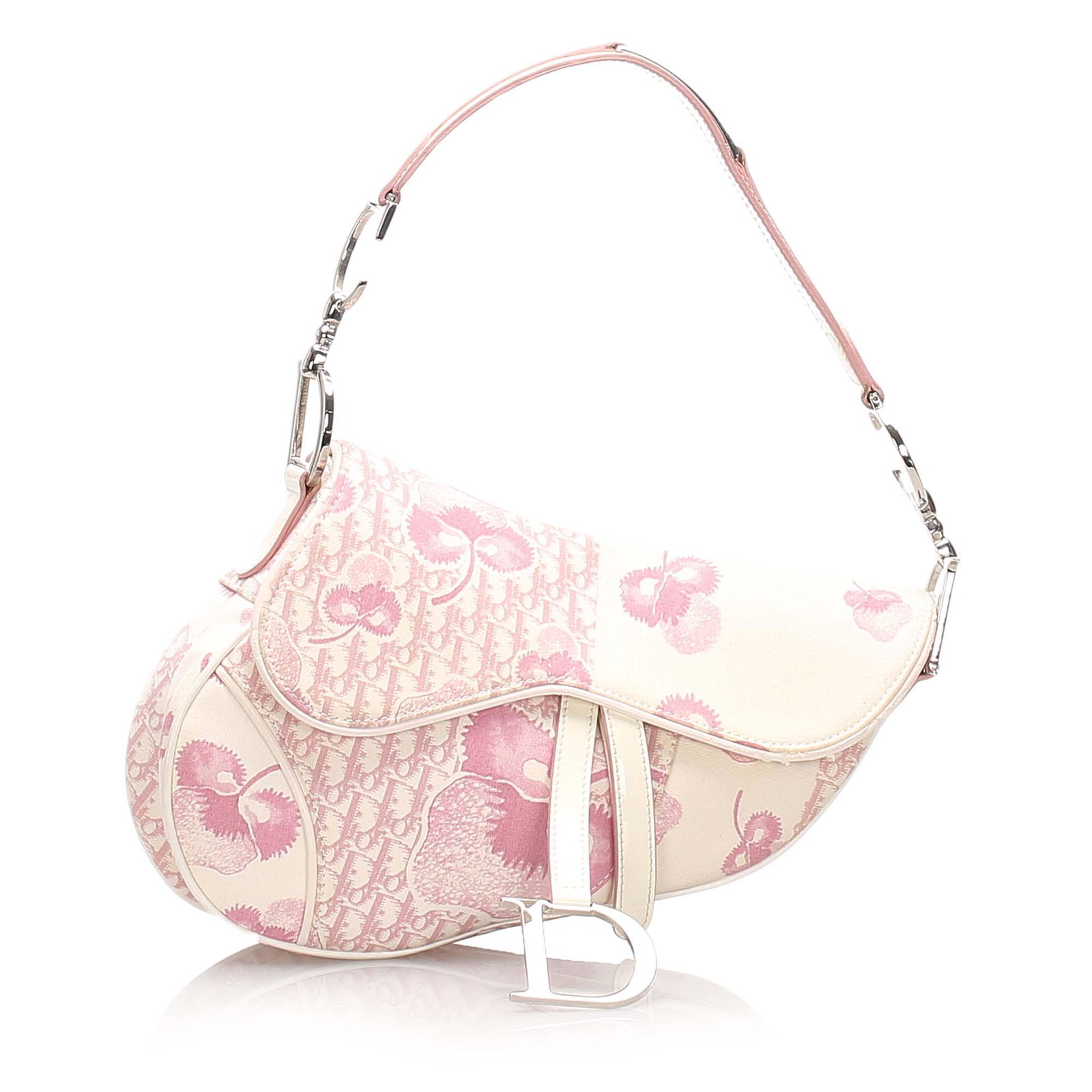 Authentic Dior Girly Saddle Bag: The Girly Saddle bag features a canvas body with leather trim, an exterior flap pocket with leather tabs and D hardware, a flat strap with silver-tone CD hardware, a top flap with a magnetic closure, 