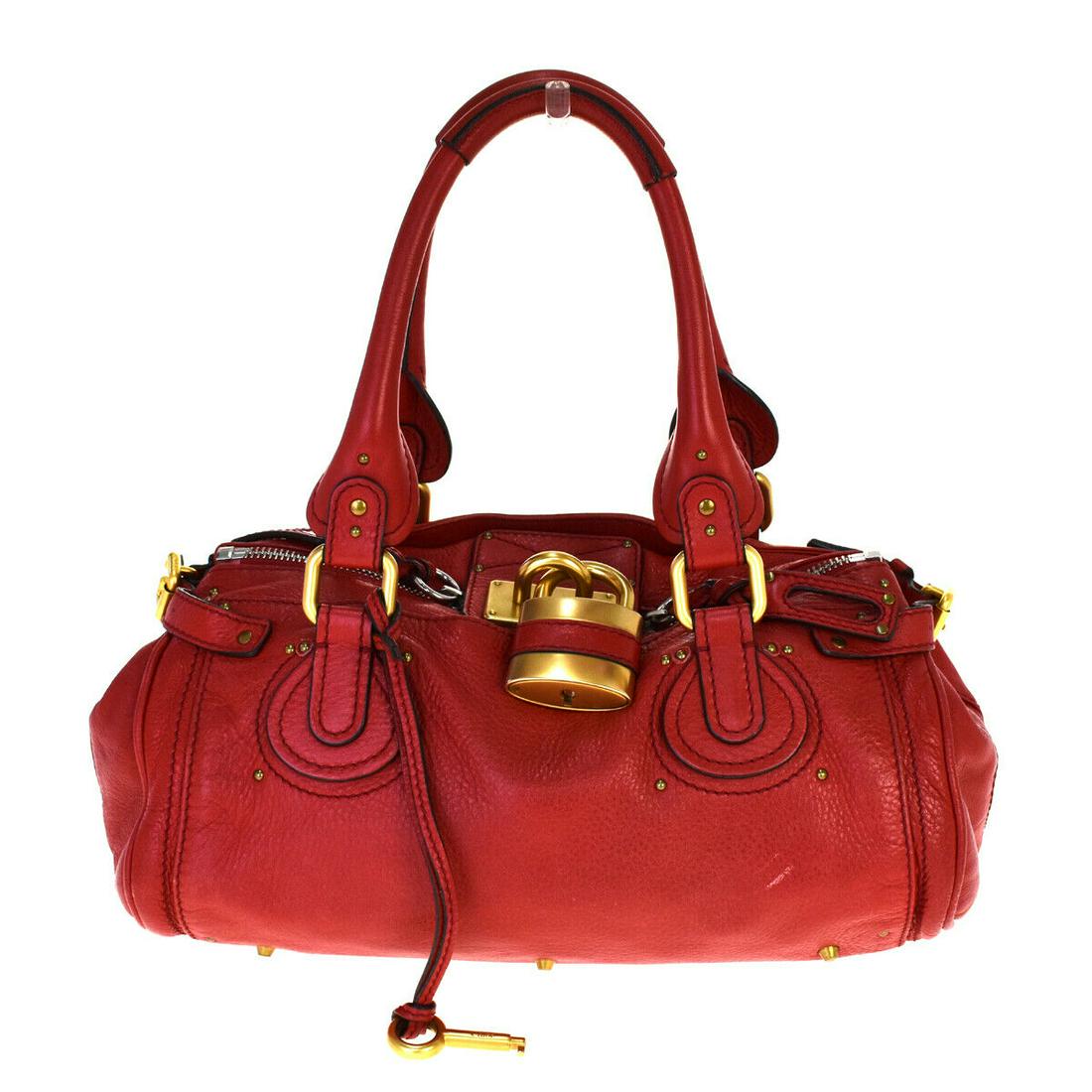 Authentic CHLOE Leather Hand bag: Brand: CHLOEMaterial: LeatherStyle: Hand bagColor: RedSize(inch): W 14.2 x H 7.1 x D 7.9 "(approx.)Country of Origin: ItalyCome with: -All Bidhaus items come with a 100% money-back authenticity guaran