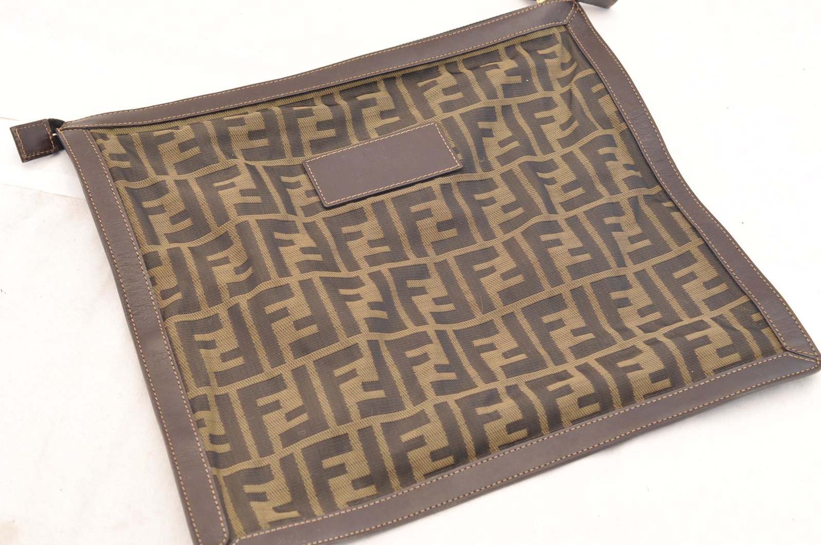 Authentic FENDI Nylon Clutch Bag: Brand: FENDIMaterial: NylonStyle: Clutch BagColor: Brown / BlackSize(inch): W12.99 x H11.81 x D0.19inch(Approx)Country of Origin: ItalyAccessory: There is no item box and dust bag. We will send only t