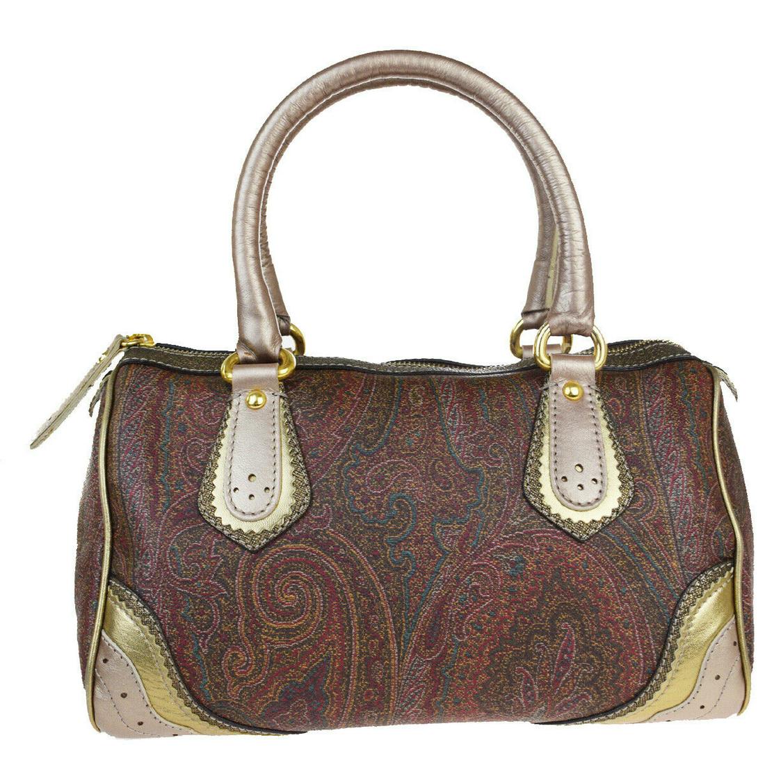 Authentic ETRO PVC Leather Hand Bag: Brand: ETRO Material: PVC Leather Style: Hand Bag Color: Bordeaux Size(inch): W 11.2 x H 6.3 x D 6.3 "(approx.) Country of Origin: Italy Come with: - All Bidhaus items come with a 100% money-back auth