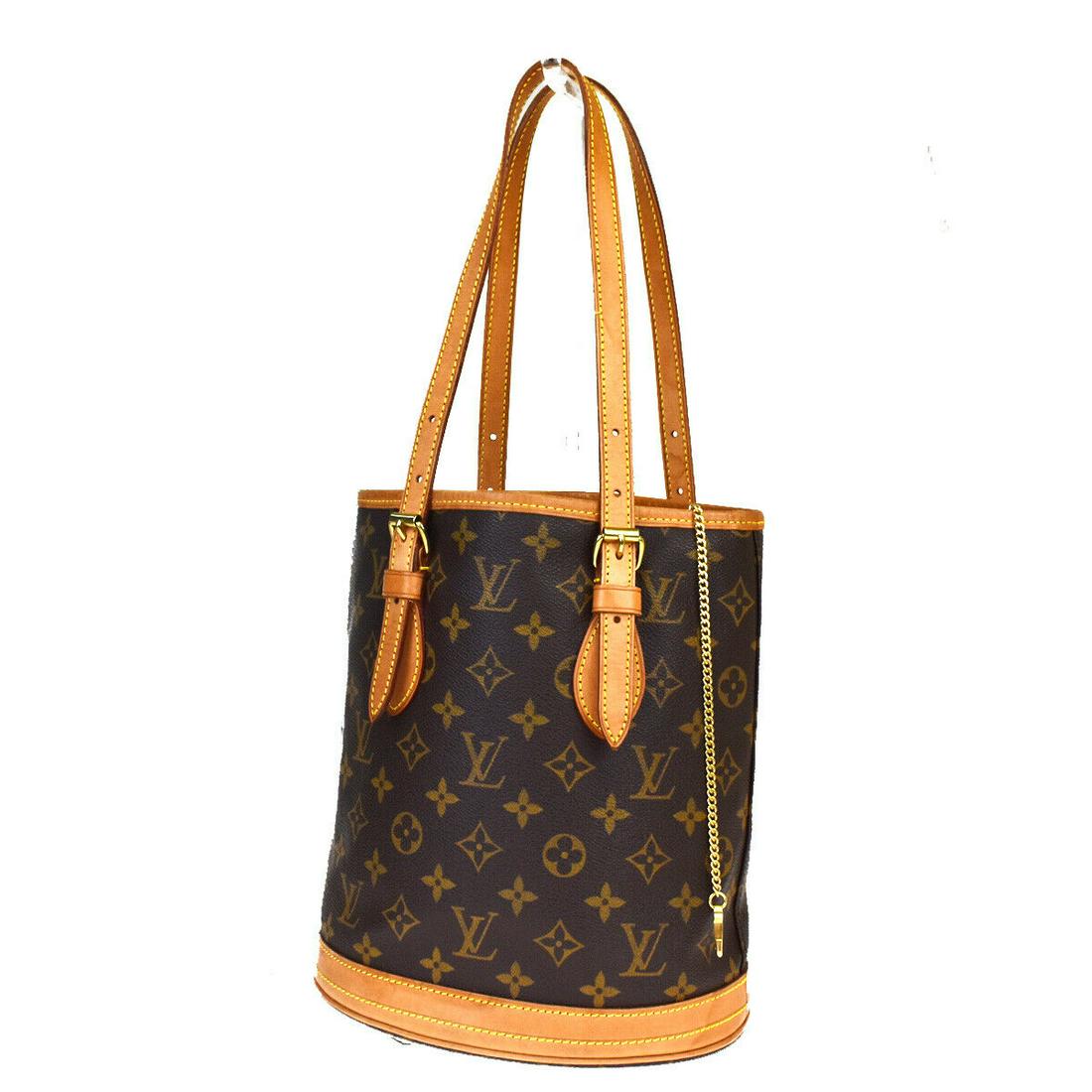Authentic LOUIS VUITTON BUCKET PM Monogram , Leather: Brand: LOUIS VUITTON Material: Monogram , Leather Style: Shoulder bag Color: Brown Size(inch): W 8.7 x H 9.8 x D 5.9 "(approx.) Country of Origin: France Come with: - All Bidhaus items come with a 100