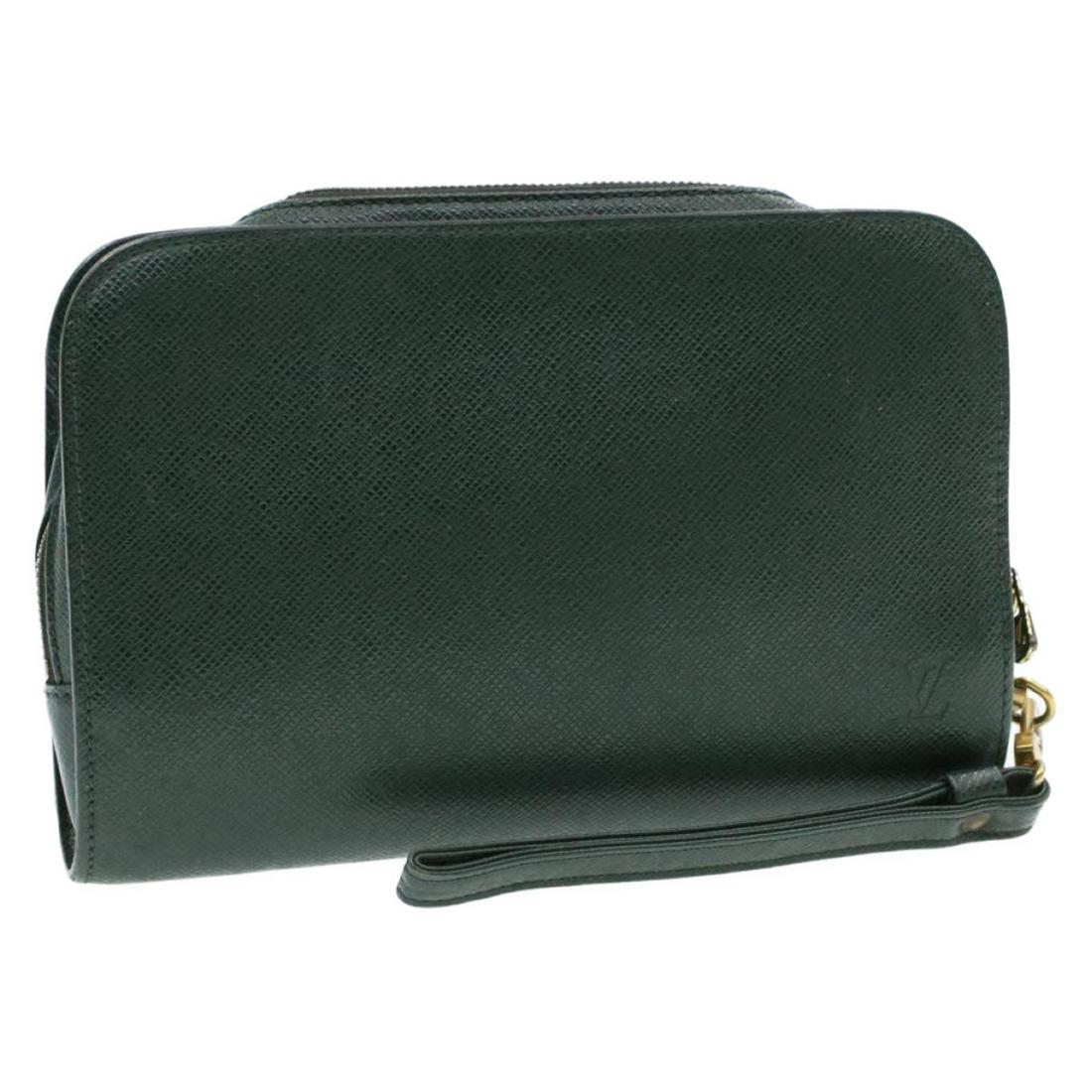 Authentic LOUIS VUITTON Taiga Leather Clutch Bag: Brand: LOUIS VUITTON Material: Taiga Leather Style: Clutch Bag Color: Green Size(inch): W9.64 x H6.29 x D1.96inch(Approx) Country of Origin: France Accessory: There is no item box and dust bag. We wil