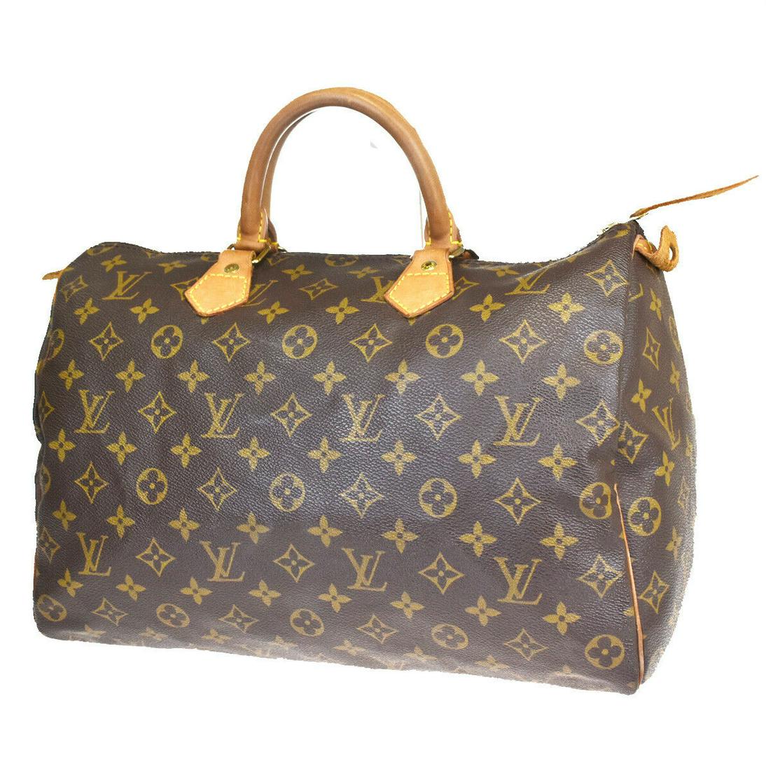 Authentic LOUIS VUITTON SPEEDY 35 Monogram Leather Hand: Brand: LOUIS VUITTON Material: Monogram Leather Style: Hand bag Color: Brown Size(inch): W 13.8 x H 9.4 x D 7.1"(approx.) Country of Origin: France Come with: - All Bidhaus items come with a 100% mone