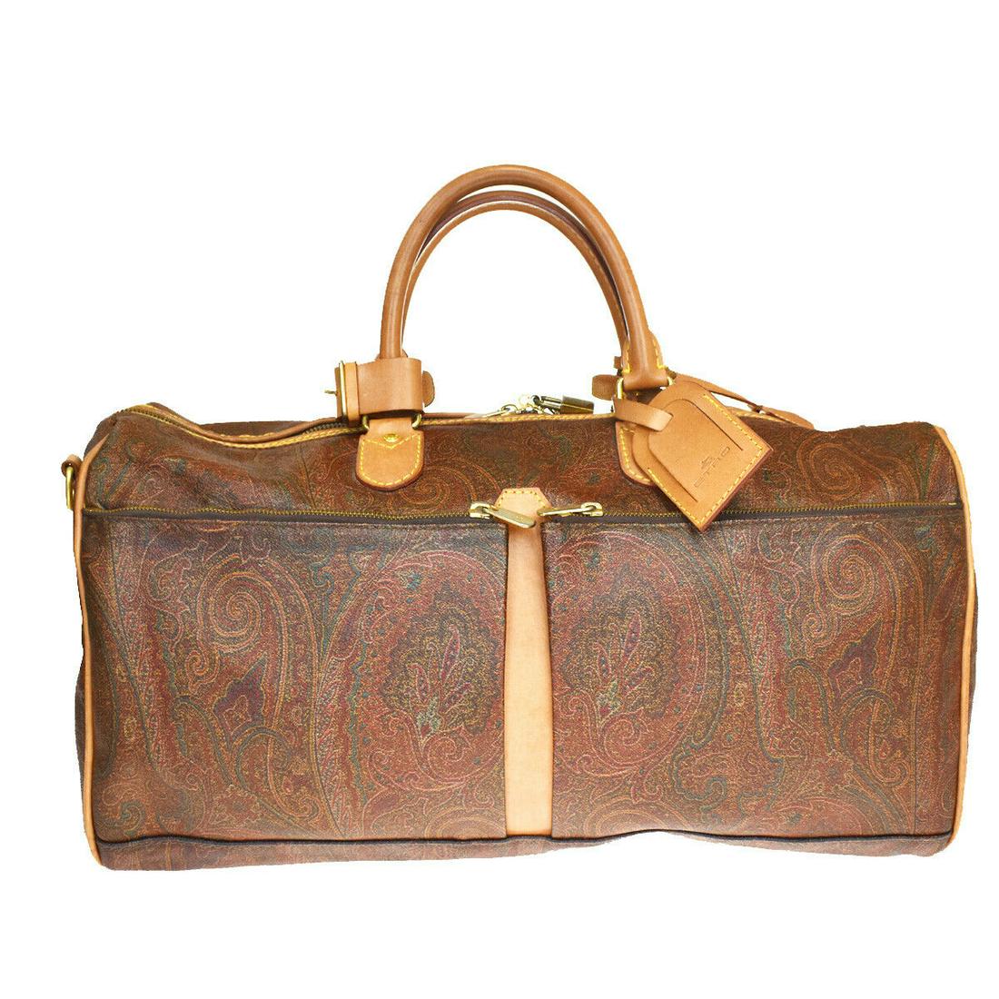 Authentic ETRO PVC Leather Hand bag: Brand: ETRO Material: PVC Leather Style: Hand bag Color: Bordeaux, Size(inch): W 19.3 x H 9.8 x D 9.1 "(approx.) Country of Origin: Italy Come with: Name tag,Handle holder,Key bell,Key*2 All Bidhaus i